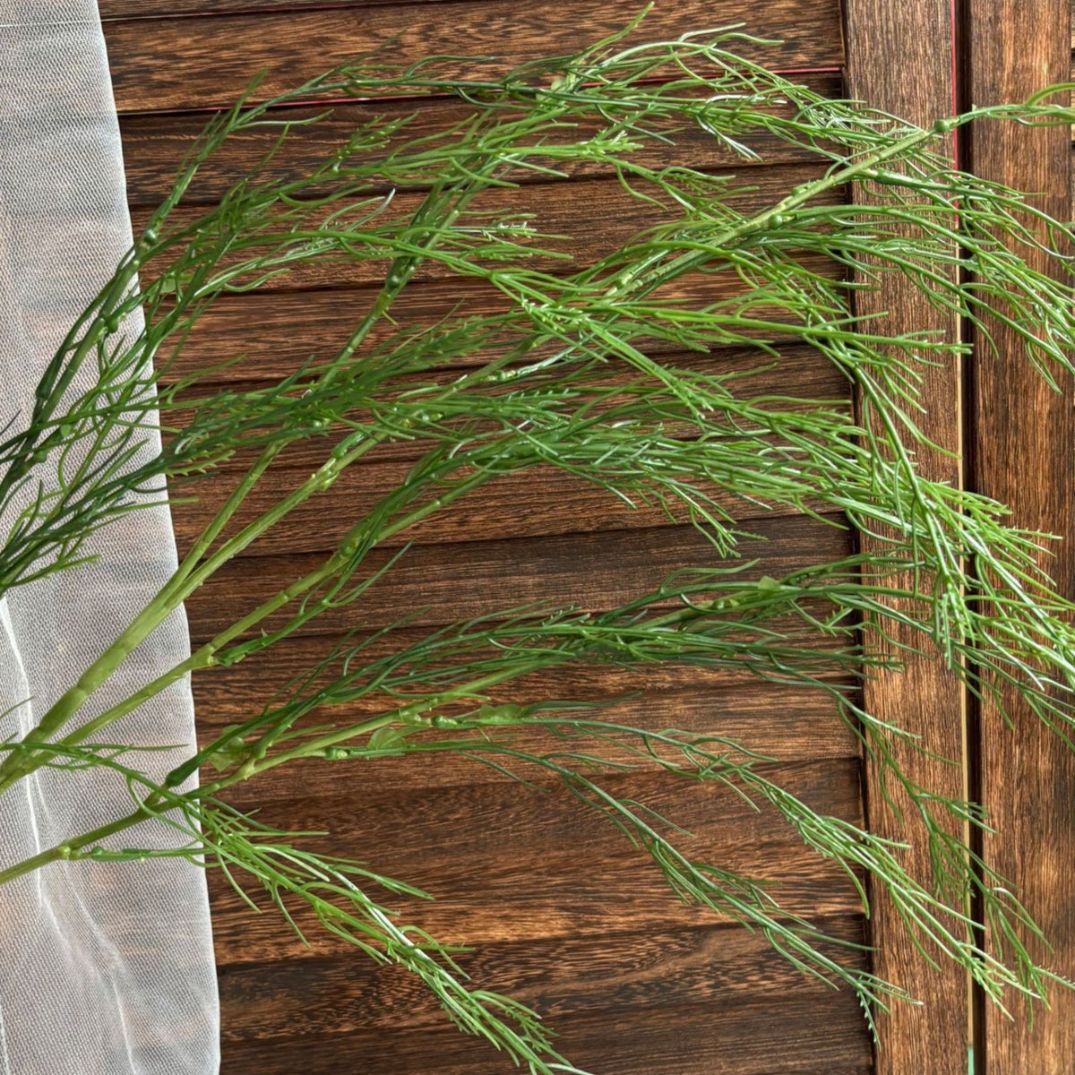 Artificial fine needle greenery spray, merchant-supplied product photo